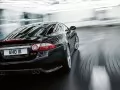 Jaguar XKR-S rushes on road