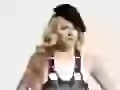 Avril Lavigne in a black beret
