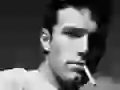 Ben Affleck with a cigarette in a teeth