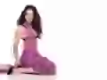 Evangeline Lilly in a violet dress