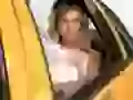 Rebecca Romijn in a taxi